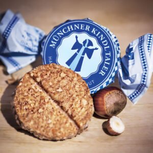 Muenchner KIndl Taler Produkt Foto. Das typische Mitbringsel aus Muenchen in Bayern